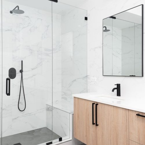 A,Beautiful,Luxury,,Modern,Bathroom,With,A,Light,Wood,Cabinet,